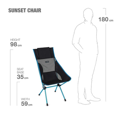 Das Diagramm zeigt die Abmessungen des Helinox Sunset Chair im Größenvergleich mit einem durchschnittlichen Menschen, wobei die bequeme Sitzhöhe hervorgehoben wird.