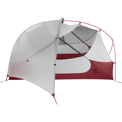 Freistehender MSR® Hubba Hubba™ NX V7, 2-Personen-Ultraleichtes-Backpacking-Zelt mit Regenschutz, teilweise nach hinten gerollt, um den Innenraum freizugeben.